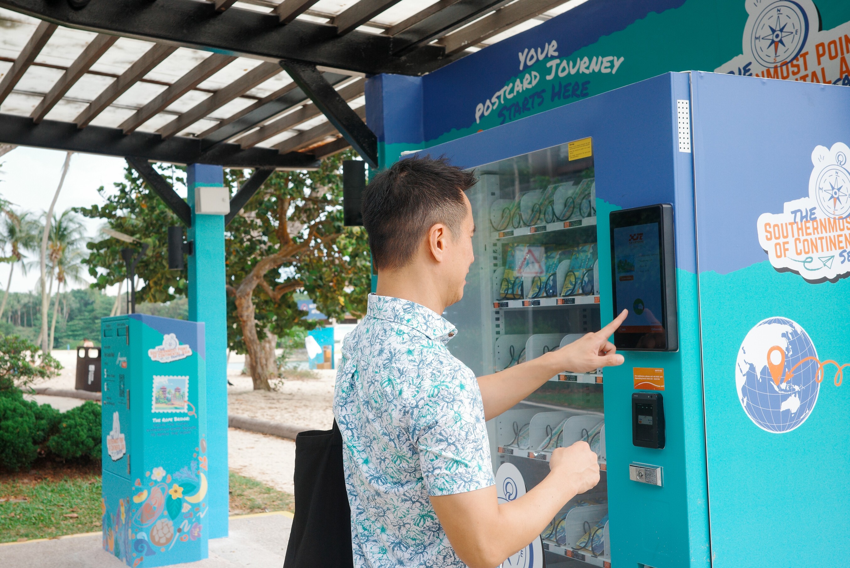 Select your postcard kit from the specially designed vending machine.